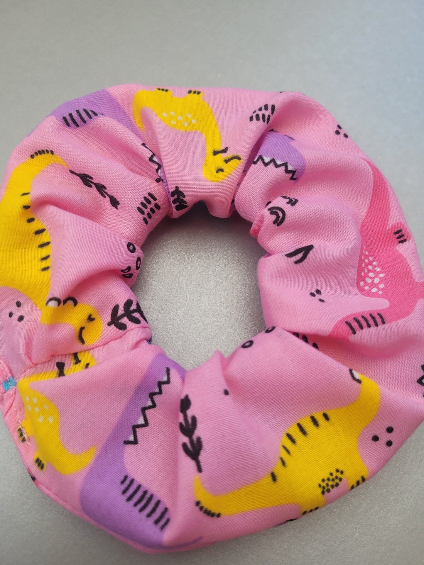 Pink Dinosaur pattern large scrunchie, Dinosaur themed elasticated hair accessory, funky dinosaurs for girls