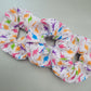 Rainbow Dinosaur pattern large scrunchie, Dinosaur themed elasticated hair accessory, funky dinosaurs for girls