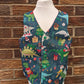Christmas Dinosaur Reversible Waistcoat, fully reversible red or dinosaur front and back, popper fastening, available from newborn to age 10