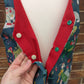 Christmas Dinosaur Reversible Waistcoat, fully reversible red or dinosaur front and back, popper fastening, available from newborn to age 10