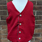 Christmas Dinosaur Reversible Waistcoat, fully reversible red or dinosaur front and back, popper fastening, available from newborn to age 10