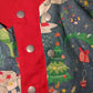 Christmas Dinosaur Reversible Waistcoat, fully reversible red or dinosaur front and back, popper fastening, available from newborn to age 10